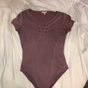 Mauve snap bodysuit